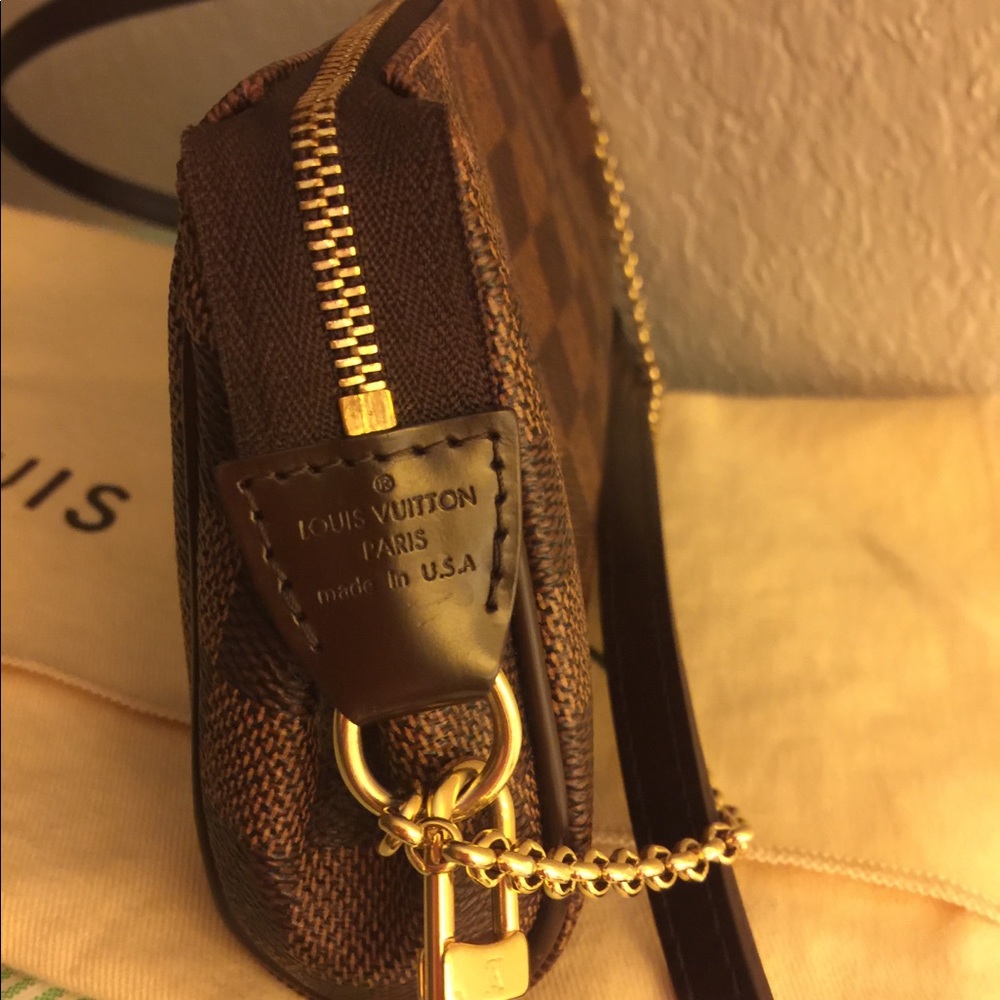LV EVA CLUTCH CROSS BODYBAG